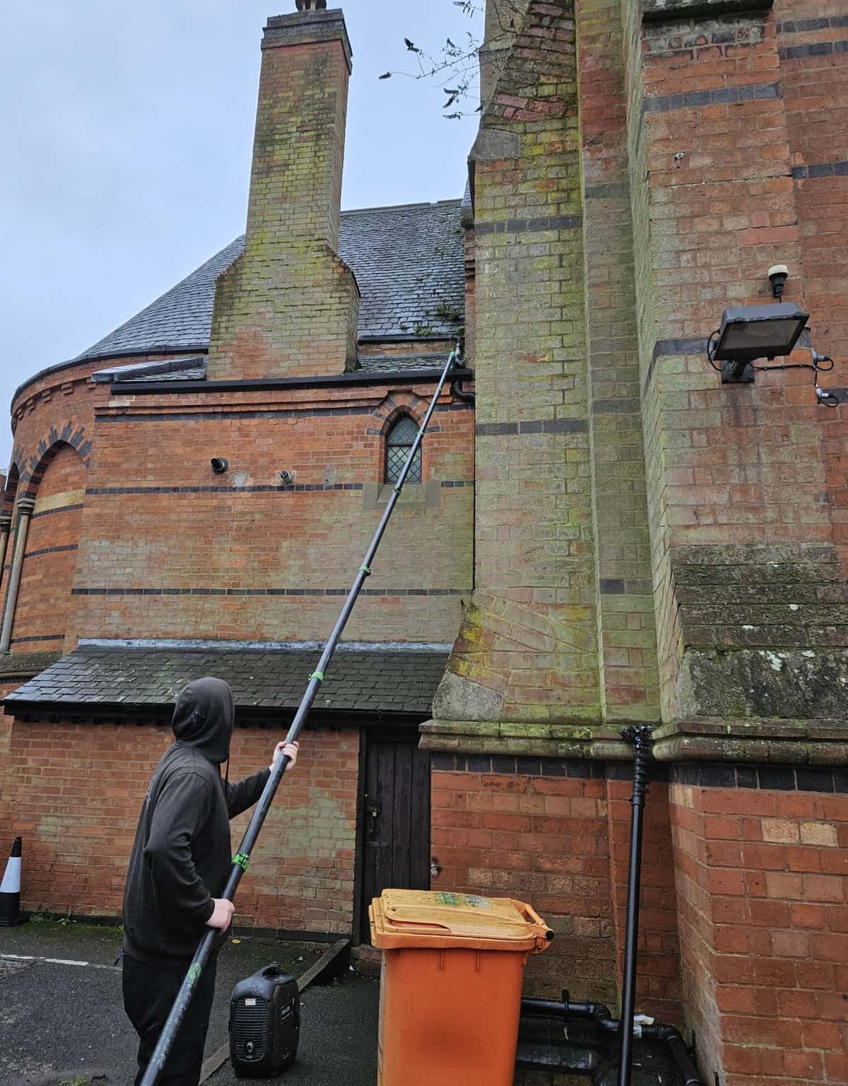 Water-fed pole cleaning on a heritage church in Leicestershire